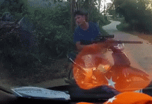 Điều tra vụ người đàn ông chĩa súng vào tài xế ôtô chia sung vao tai xe oto anh 1