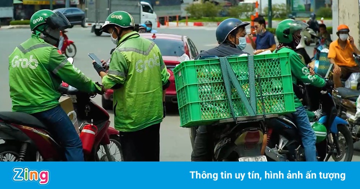 Grab và Gojek nói giá giao hàng tại TP.HCM tăng cao do thiếu shipper Grab và Gojek nói giá giao hàng tại TP.HCM tăng cao do thiếu shipper