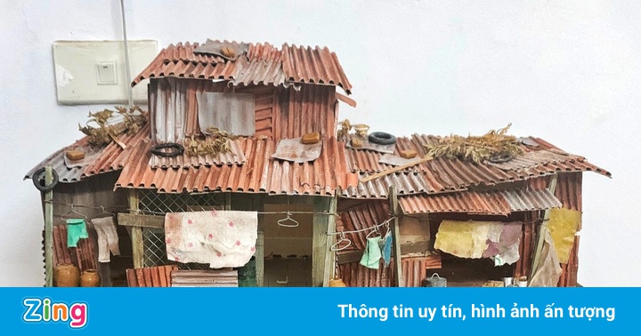 Trang trí bể thủy sinh bằng mô hình nhà ở miền Tây