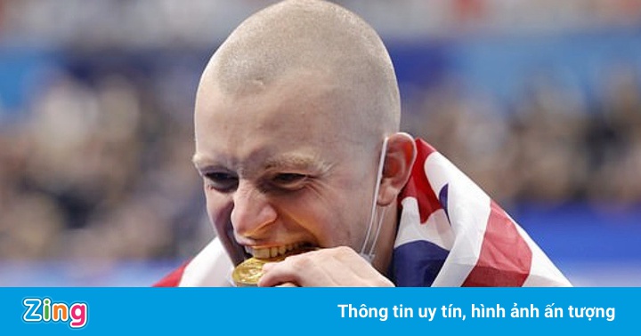 Vì sao các VĐV Olympic thích cắn huy chương? Vì sao các VĐV Olympic thích cắn huy chương?