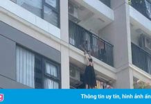 Giận chồng khi uống bia, vợ trèo ra ban công chung cư cao tầng