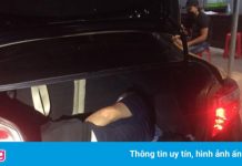 Người đàn ông Trung Quốc trốn trong cốp xe để vượt chốt phòng dịch