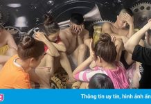 13 nam, nữ tụ tập trong một phòng ngủ