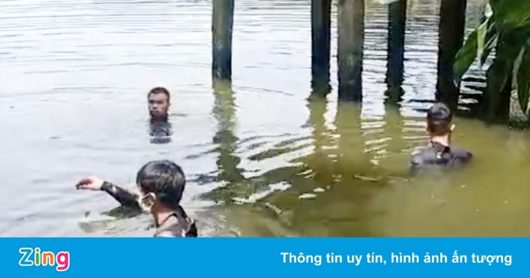 Cảnh sát ở TP.HCM mất nhiều giờ lặn tìm 2 người nhảy xuống ao