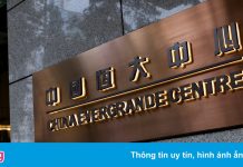 Thoát vỡ nợ vào phút chót, China Evergrande vẫn đứng trên bờ vực