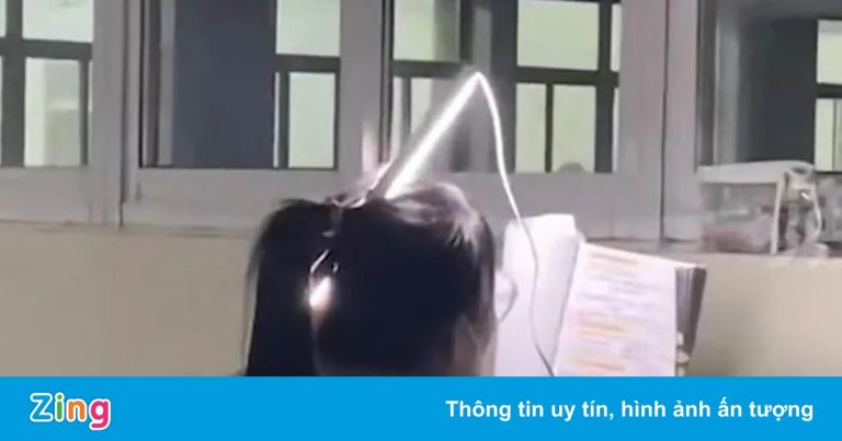 Nữ sinh Trung Quốc gắn bóng đèn vào đầu để ôn thi