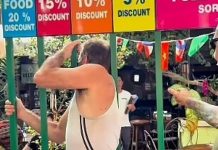 Tranh cãi nhà hàng cho khách chui qua song sắt để được giảm giá đồ ăn